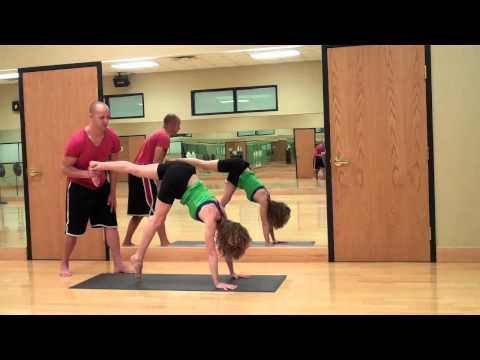 Adho Mukha Vrksasana (Handstand) with Partner assist